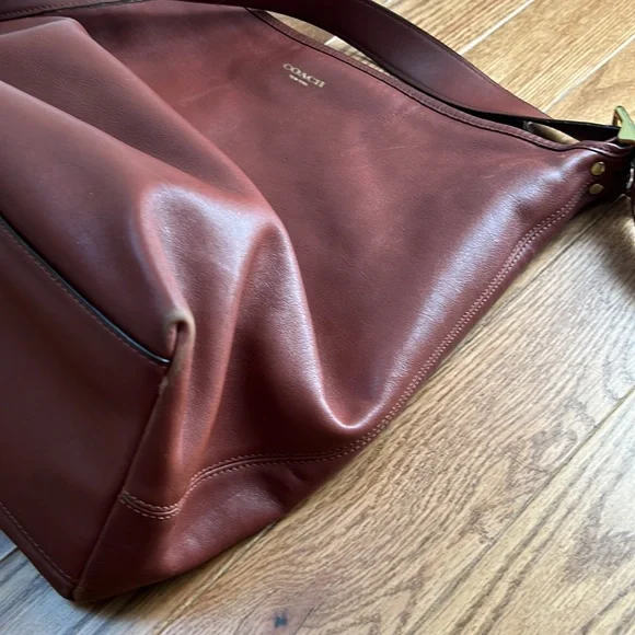Saddle-color Coach Crossbody Bucket - Picture 6 of 14